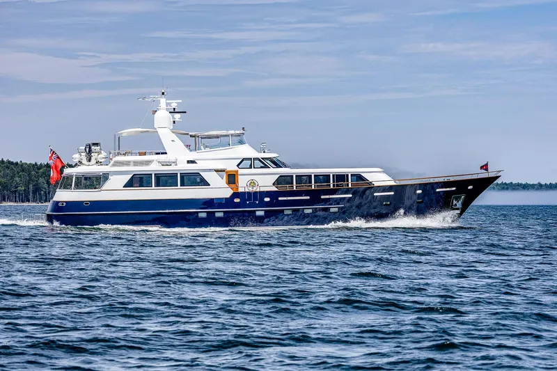 Slide: The Image of Luxurious 2004 Holland Jachtbouw Custom yacht cruising on open water. - 82