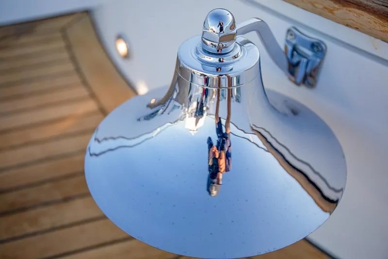 Slide: The Image of Close-up of a polished chrome bell on a 2004 Holland Jachtbouw Custom yacht. - 15