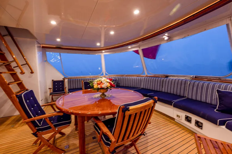 Slide: The Image of Luxurious 2004 Holland Jachtbouw Custom yacht interior with elegant seating and wooden table. - 37