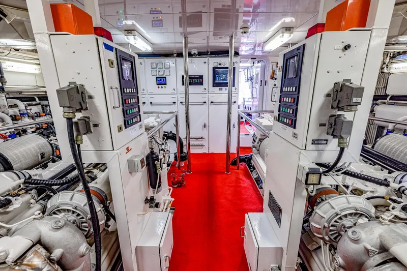 Slide: The Image of Engine room of 2004 Holland Jachtbouw Custom yacht with control panels and machinery. - 63