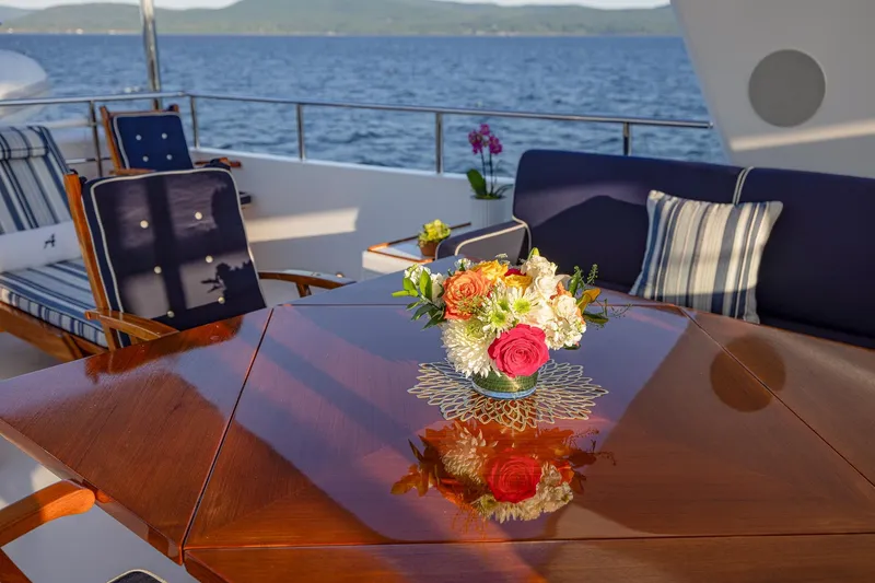 Slide: The Image of Luxurious yacht deck with floral centerpiece, Holland Jachtbouw Custom 2004, ocean view. - 13