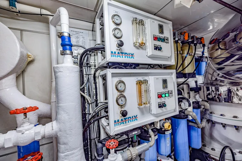 Slide: The Image of Engine room of 2004 Holland Jachtbouw Custom yacht with Matrix control panels and piping. - 62