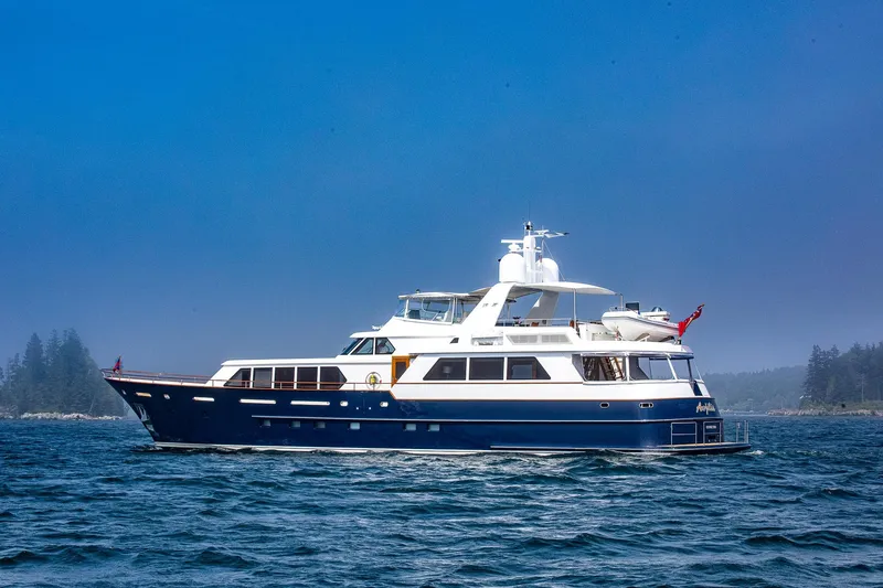 Slide: The Image of Luxurious 2004 Holland Jachtbouw Custom yacht cruising on a serene blue sea. - 78