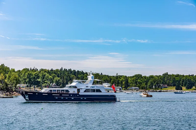 Slide: The Image of Luxurious 2004 Holland Jachtbouw Custom yacht cruising on a scenic lake. - 83