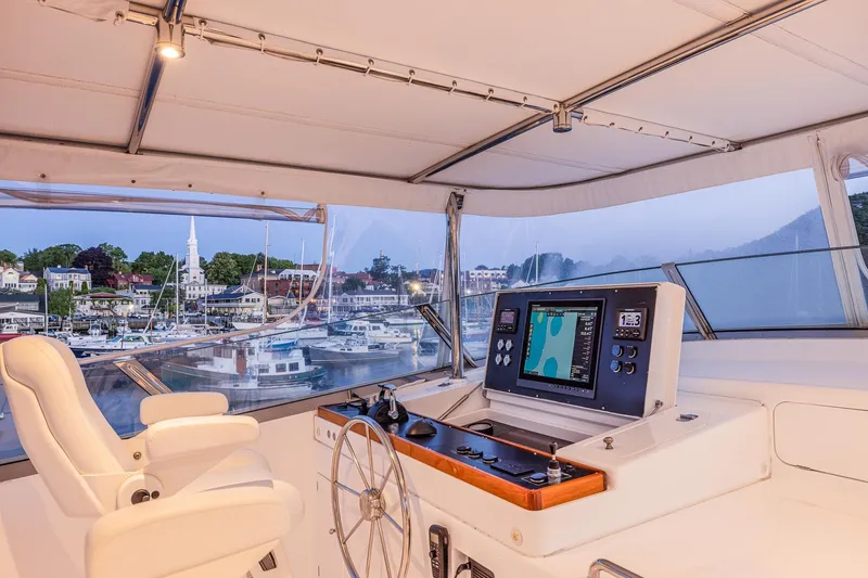Slide: The Image of Helm of 2004 Holland Jachtbouw Custom yacht overlooking marina with modern navigation equipment. - 25