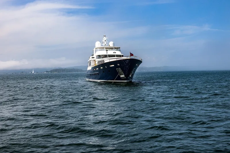 Slide: The Image of Luxurious 2004 Holland Jachtbouw Custom yacht sailing on open sea under clear skies. - 69
