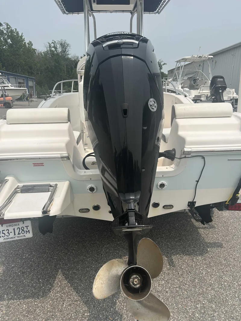 Slide: The Image of A 2015 Tidewater 180 CC Adventurer with an outboard motor, parked on a lot. - 8