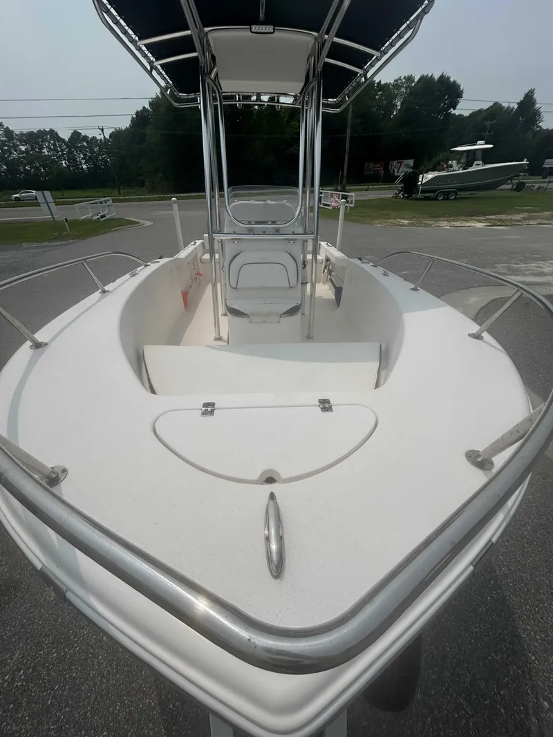 Slide: The Image of A 2015 Tidewater 180 CC Adventurer with an open deck and stainless steel railing. - 5