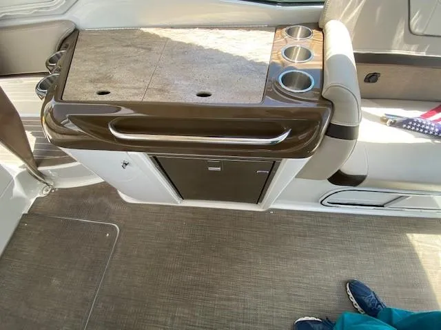 Slide: The Image of 2017 Formula 350 Sun Sport boat interior with countertop and cup holders. - 22