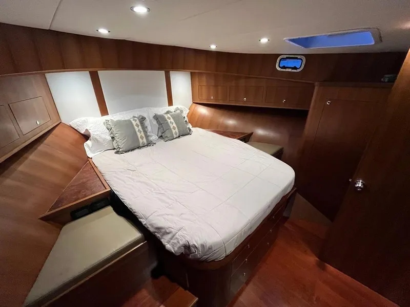 Slide: The Image of Luxurious cabin interior of 2025 Bracewell 41 yacht with cozy bed and wooden finish. - 20