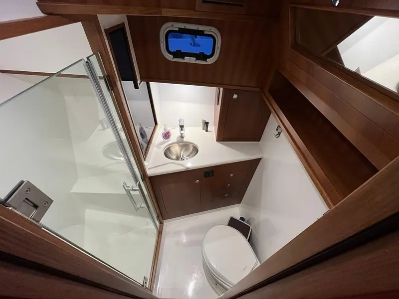 Slide: The Image of Modern bathroom in 2025 Bracewell 41 yacht with sleek design and compact layout. - 25