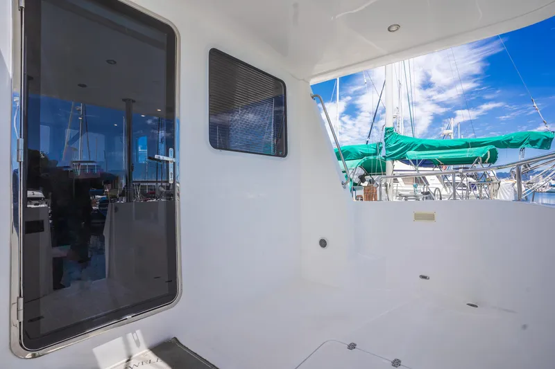Slide: The Image of Spacious deck of 2025 Bracewell 41 yacht with marina view. - 8