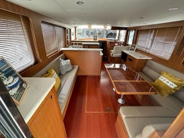 Slide: The Image of Luxurious 2025 Bracewell 41 yacht interior with elegant wood finishes and comfortable seating. - 11