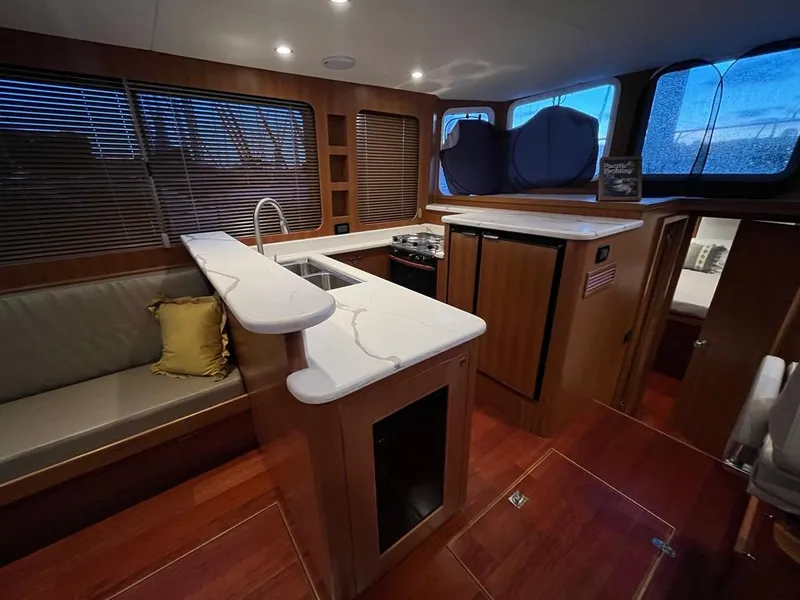 Slide: The Image of Modern Bracewell 41 yacht interior with kitchen and seating area, 2025 model. - 28