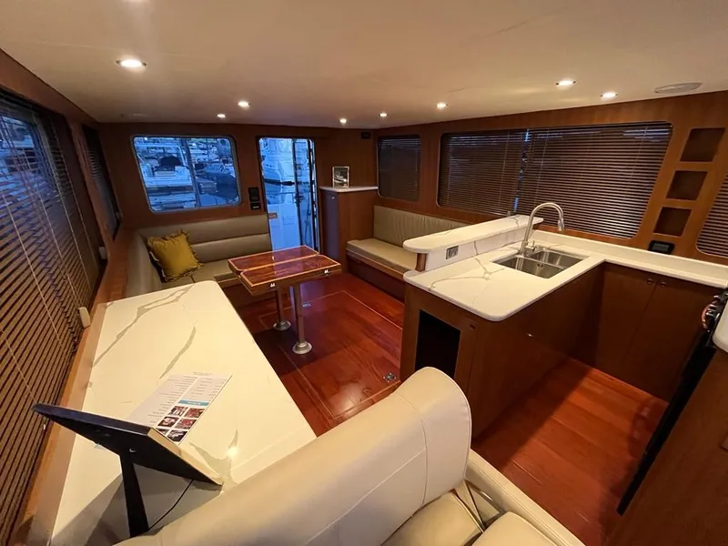 Slide: The Image of Luxurious interior of 2025 Bracewell 41 yacht with modern kitchen and seating area. - 41