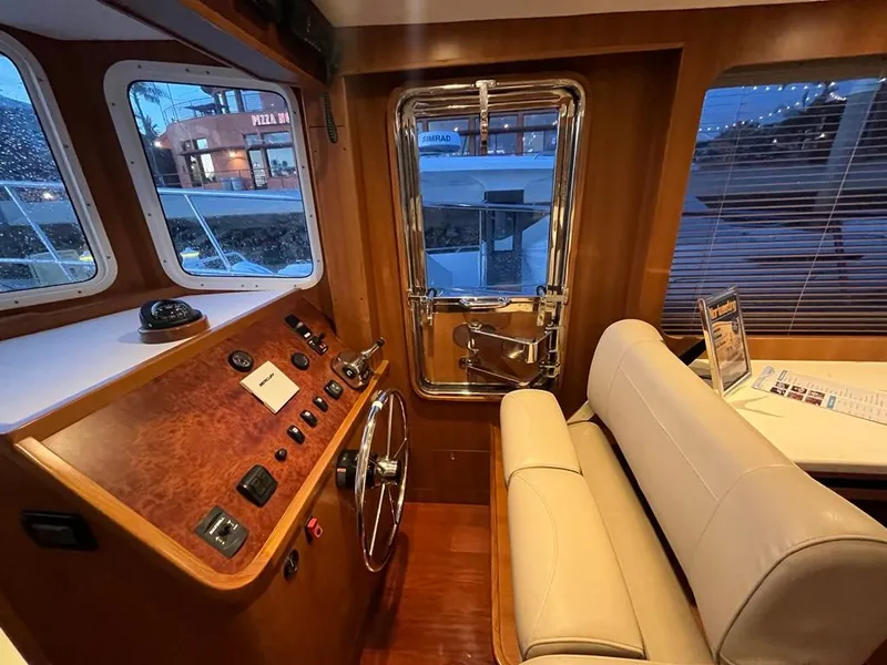 Slide: The Image of Interior of 2025 Bracewell 41 boat with steering wheel and control panel. - 39