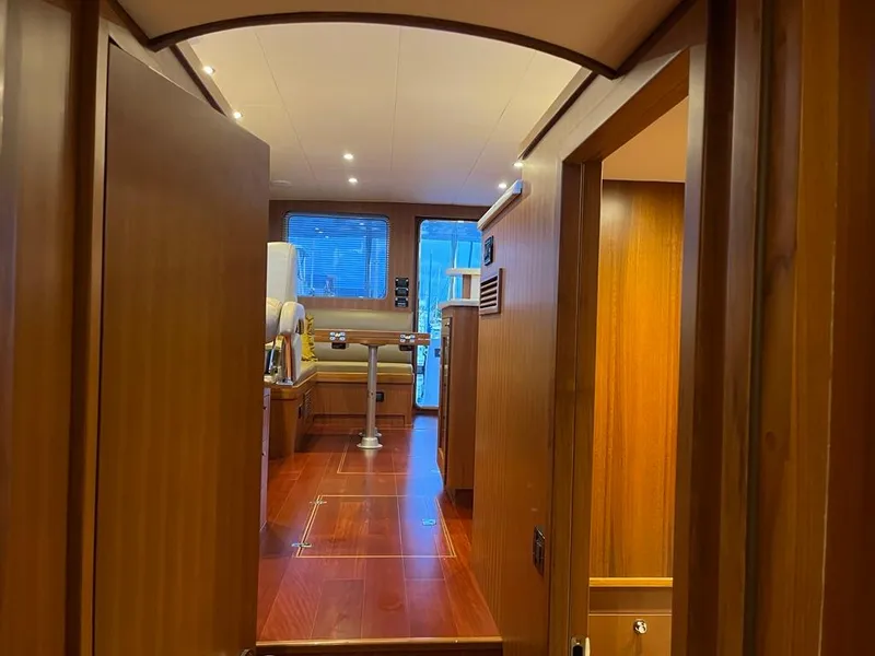 Slide: The Image of Interior of 2025 Bracewell 41 yacht with wooden finishes and modern design. - 23