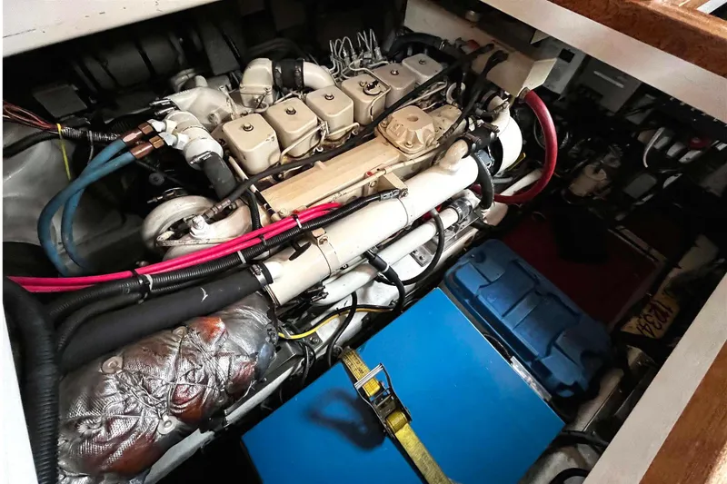 Slide: The Image of Engine room of 1997 Ocean Alexander 440 Sundeck CPMY with visible components and wiring. - 31