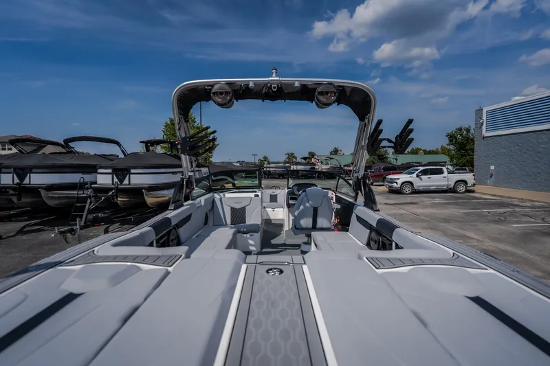 Slide: The Image of 2024 MasterCraft XT25 boat interior with sleek design and modern features. - 11
