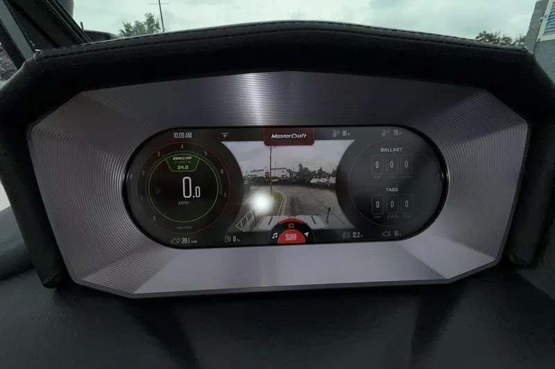 Slide: The Image of 2024 MasterCraft XT25 dashboard display showing speed, ballast, and camera view. - 16