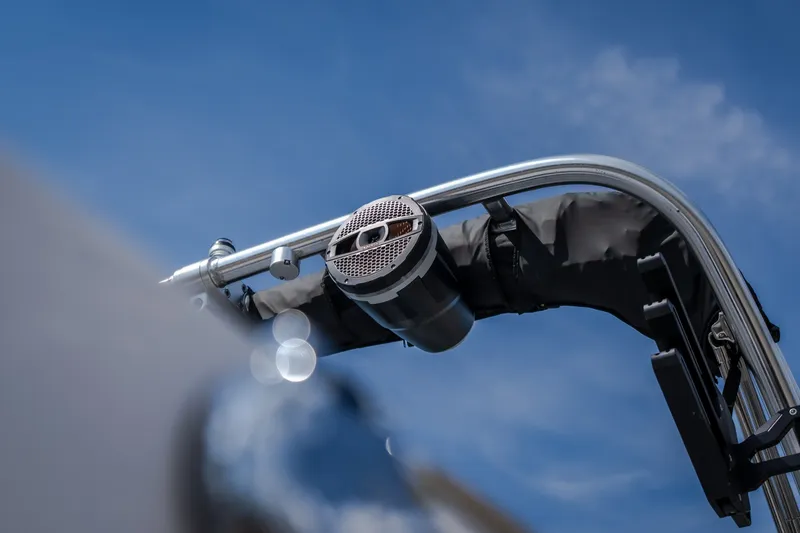 Slide: The Image of 2024 MasterCraft XT25 boat speaker system against a clear blue sky. - 10