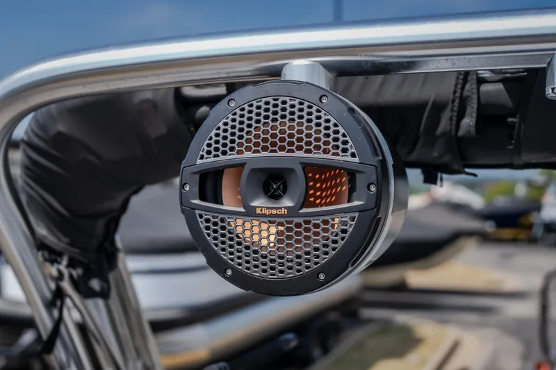 Slide: The Image of Klipsch speaker on 2024 MasterCraft XT25 boat, mounted on metal frame, close-up view. - 14