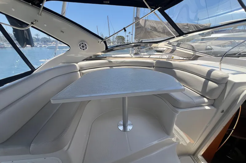 Slide: The Image of Luxurious interior of 2000 Regal Commodore 4160 yacht with sleek seating and table. - 6