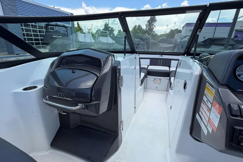 Slide: The Image of 2024 Monterey M4 boat interior with seating and dashboard, showcasing modern design and functionality. - 26