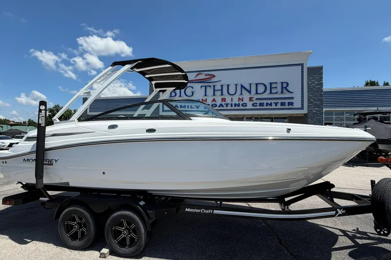 The Image of 2024 Monterey M4 boat on trailer at Big Thunder Marine dealership. - 1