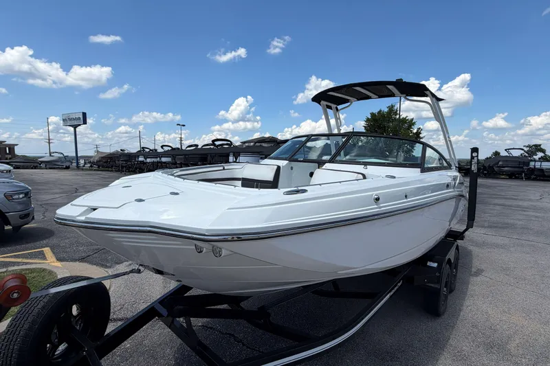 Slide: The Image of 2024 Monterey M4 boat on trailer under blue sky with clouds. - 38