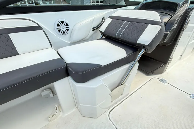 Slide: The Image of 2024 Monterey M4 boat interior with stylish seating and speaker system. - 9