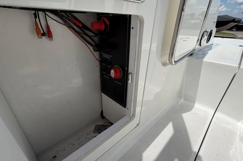 Slide: The Image of 2024 Monterey M4 boat electrical panel with wiring and switches. - 16