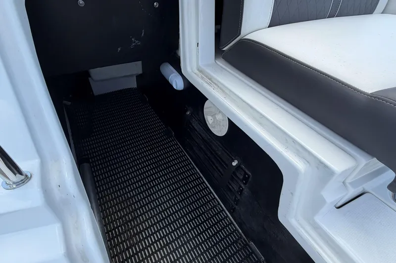 Slide: The Image of Interior view of a 2024 Monterey M4 boat, featuring seating and flooring details. - 6