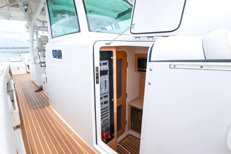 Slide: The Image of 2018 HCB 53 Suenos yacht interior with open cabin door and control panel. - 36
