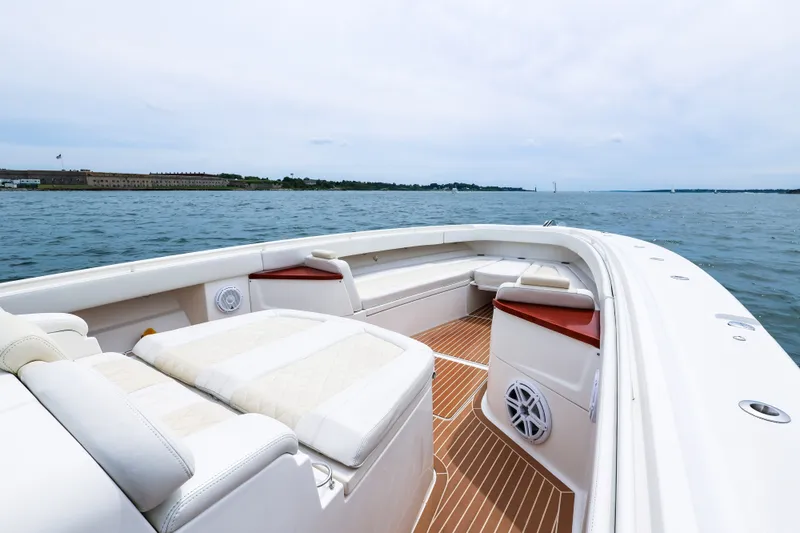 Slide: The Image of 2018 HCB 53 Suenos boat interior with cushioned seating on open water. - 51