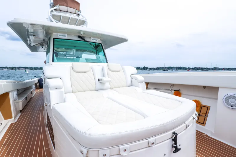 Slide: The Image of Luxurious 2018 HCB 53 Suenos yacht with plush white seating and sleek design. - 52