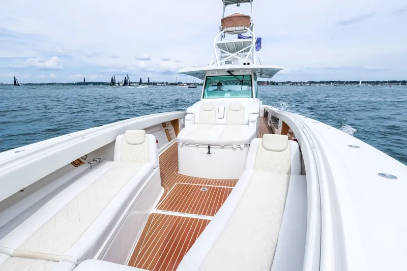 Slide: The Image of 2018 HCB 53 Suenos luxury boat with spacious seating on open water. - 49