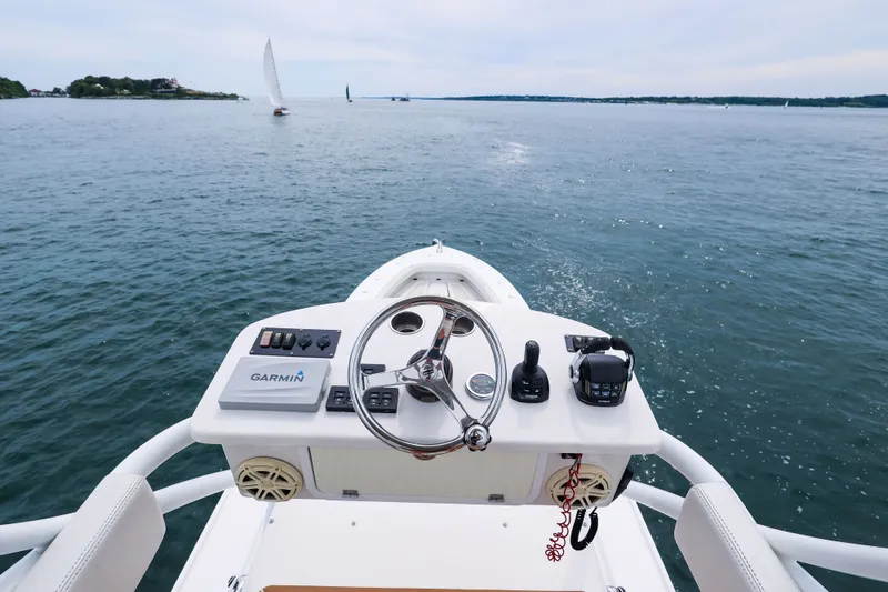Slide: The Image of Helm of 2018 HCB 53 Suenos boat with Garmin navigation on open water. - 66
