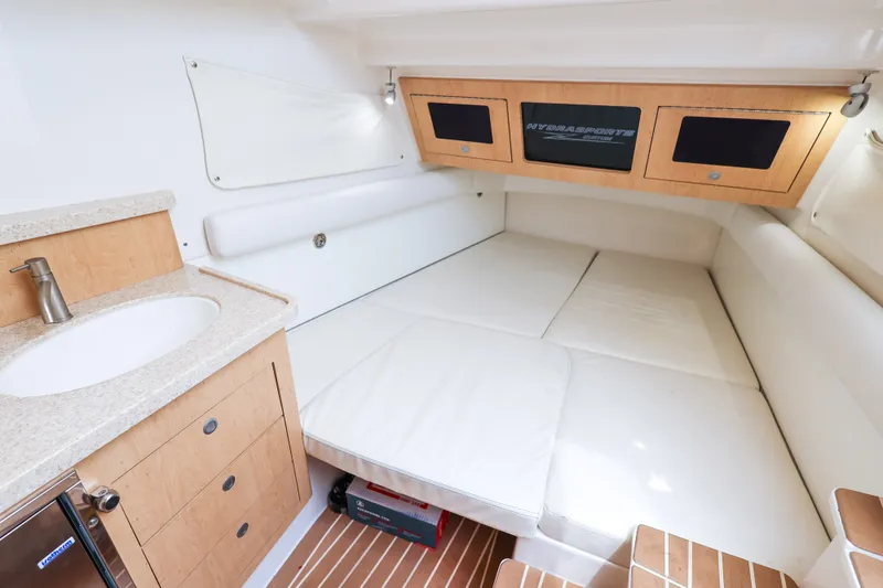 Slide: The Image of Luxurious interior cabin of 2018 HCB 53 Suenos yacht with comfortable seating and sink. - 40