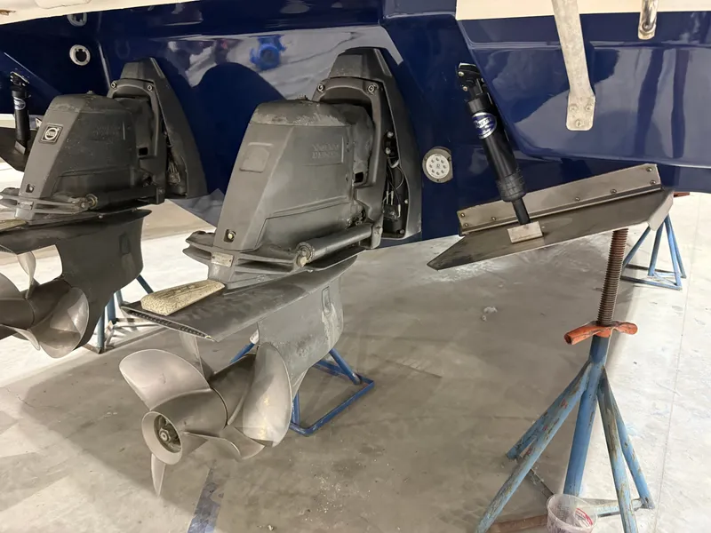 Slide: The Image of The image shows the drive system of a 2018 Regal 35 Sport Coupe on stands. - 16