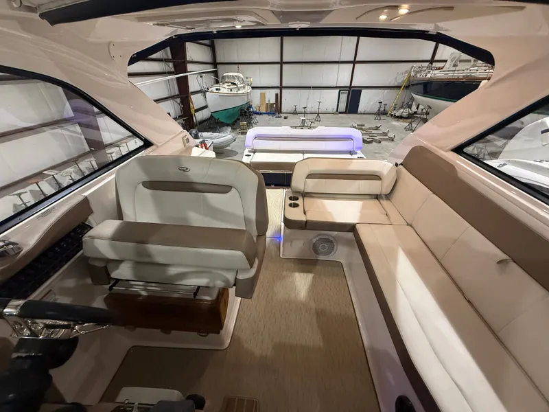 Slide: The Image of Interior of a 2018 Regal 35 Sport Coupe with beige seating and modern design. - 24