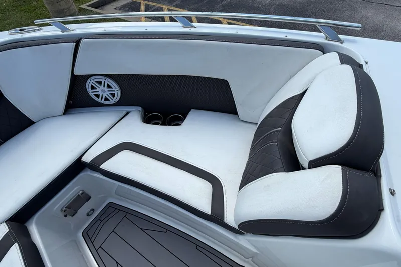 Slide: The Image of Interior seating of 2023 Monterey 238SS Super Sport boat with speaker and cup holders. - 39