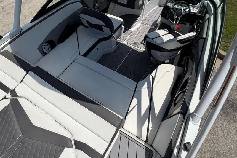 Slide: The Image of Interior of 2023 Monterey 238SS Super Sport boat with sleek seating and modern design. - 19