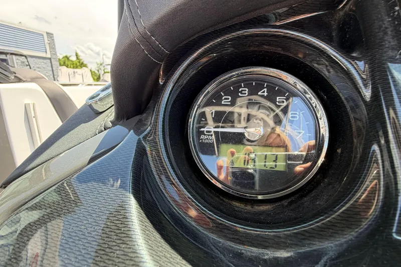 Slide: The Image of Close-up of 2023 Monterey 238SS Super Sport tachometer displaying RPM and digital readout. - 42