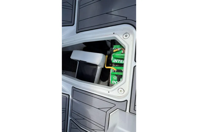 Slide: The Image of Battery compartment of 2023 Monterey 238SS Super Sport boat, featuring Interstate batteries. - 40