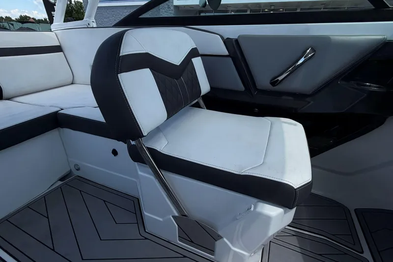 Slide: The Image of Interior of 2023 Monterey 238SS Super Sport boat with stylish seating and modern design. - 25