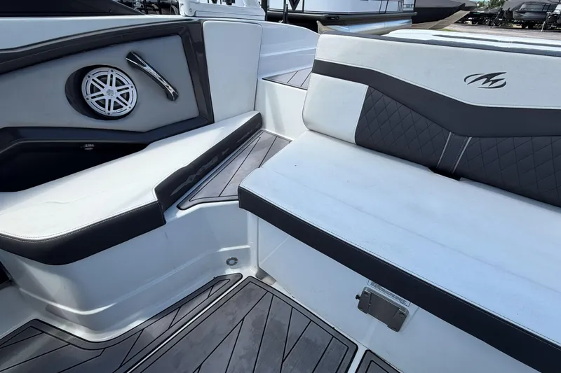 Slide: The Image of Interior of 2023 Monterey 238SS Super Sport boat with stylish seating and speaker. - 30