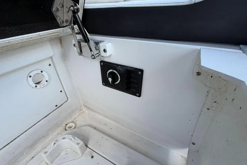 Slide: The Image of Interior view of a 2023 Monterey 238SS Super Sport boat control panel. - 41