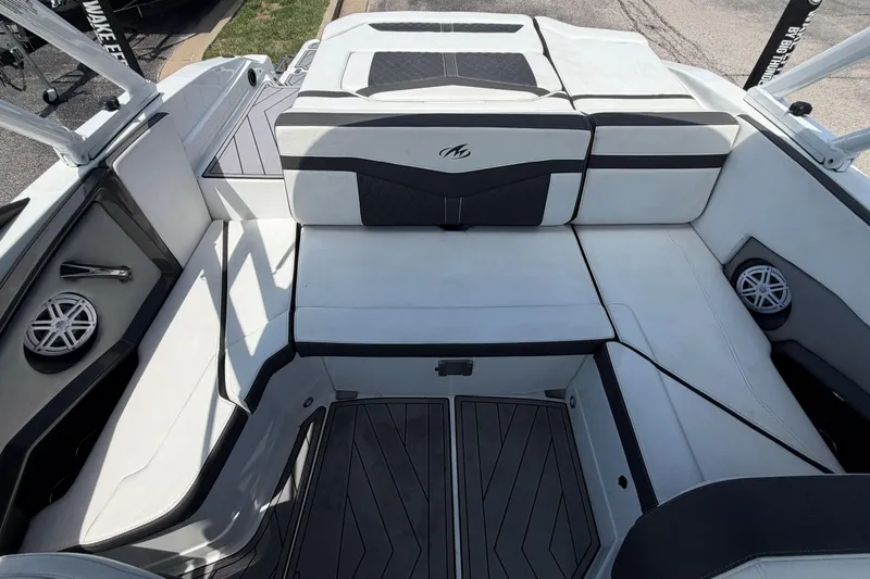 Slide: The Image of 2023 Monterey 238SS Super Sport boat interior with sleek seating and modern design. - 21
