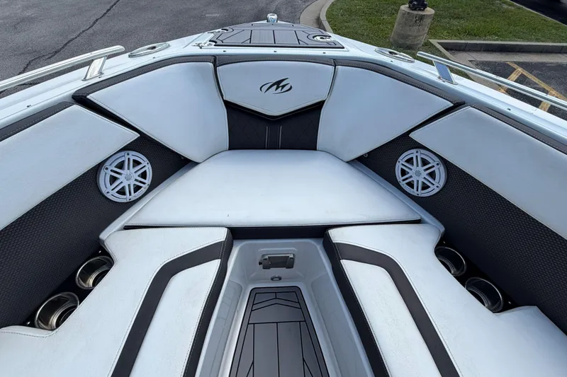 Slide: The Image of 2023 Monterey 238SS Super Sport boat interior with white seating and speaker system. - 38
